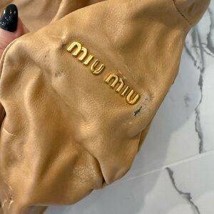 Miu Miu Tan Bag with Gold Logo